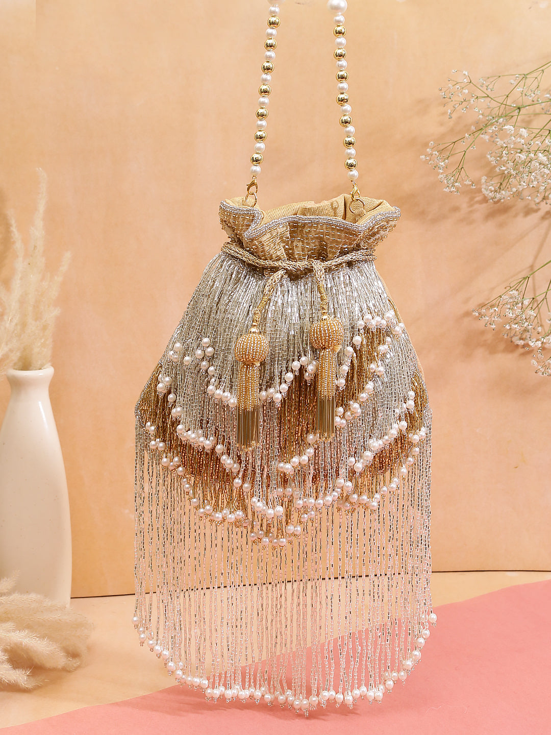 gold and silver blended tassel potli