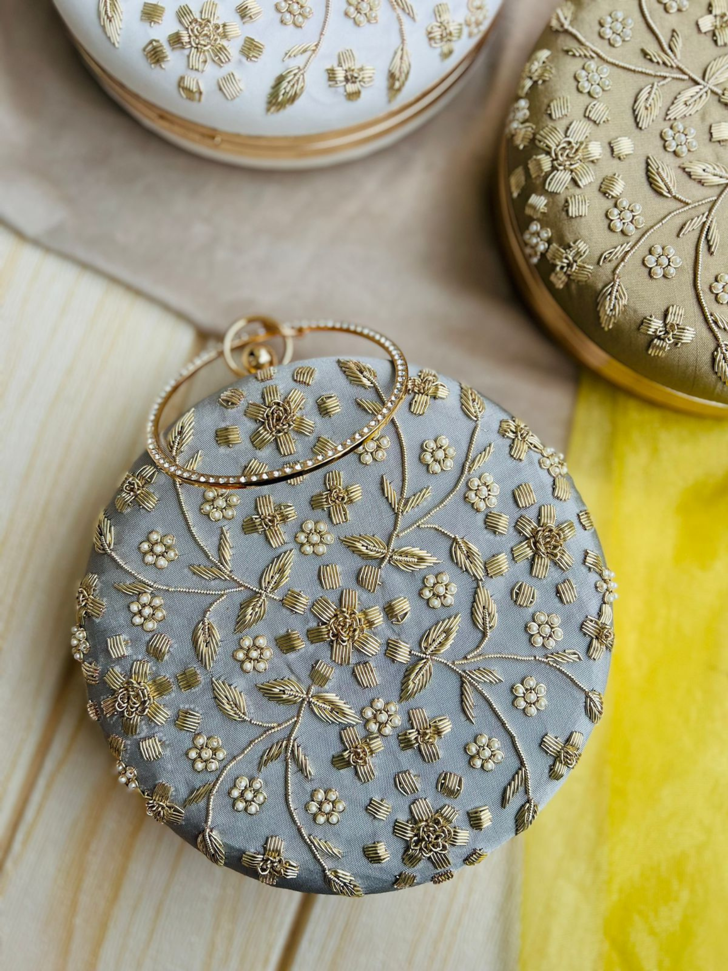 Zari Bloom Round Clutch