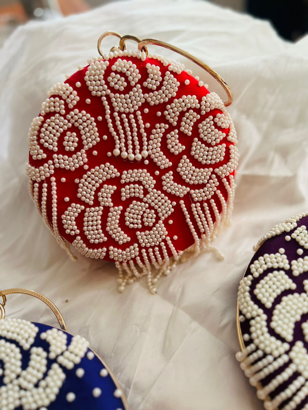 Rosette Pearl Round Clutch