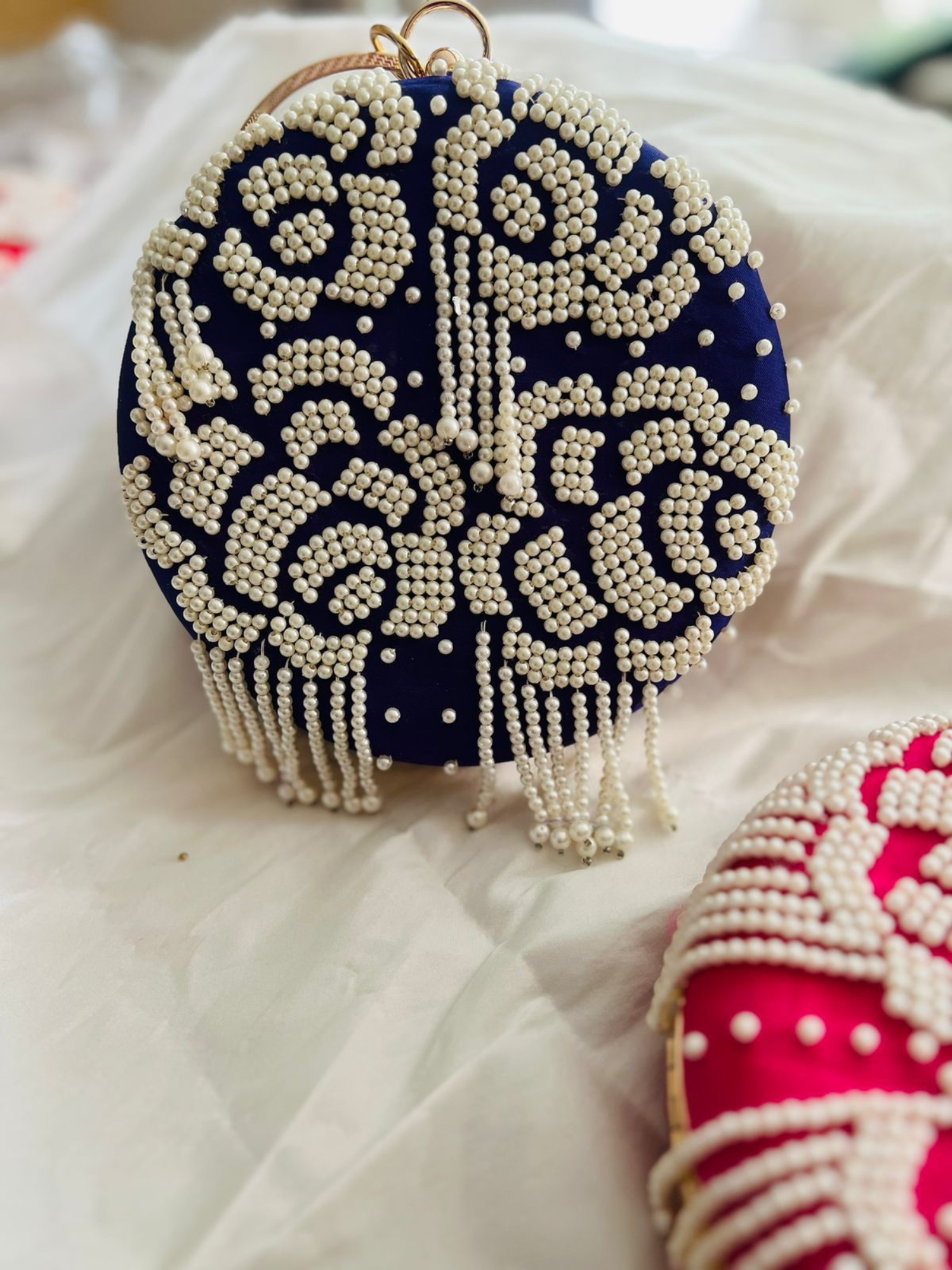 Rosette Pearl Round Clutch