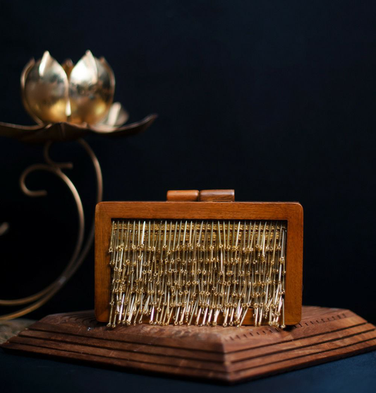 Golden Tassel Embellished Wooden Clutch