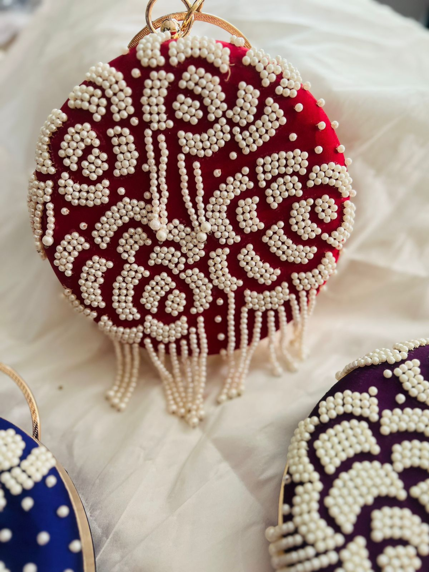 Rosette Pearl Round Clutch